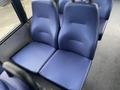 Two blue fabric seats designed for a Chevrolet Express van