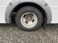 Close-up of a wheel and tire of a 2017 Chevrolet Express showing the rim and tread details