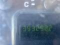 A digital odometer display showing the reading 393290.2 on a Ford Econoline van