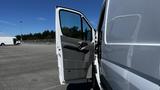 A 2016 Mercedes-Benz Sprinter van with the driver's side door open