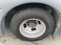 Close-up of a 2017 Chevrolet Express tire showing the wheel and tread pattern