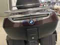 A 2013 BMW K1600GTL motorcycle rear view showcasing the sleek body design and chrome details