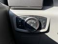 Control panel for headlights and fog lights in a 2017 Ford F-150 featuring a dial and several buttons for different lighting options