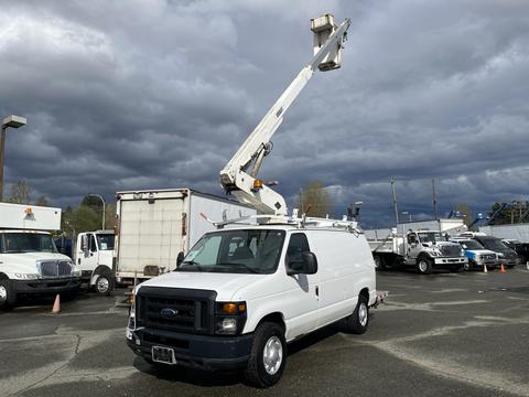 A white 2008 Ford Econoline van with an extended bucket lift apparatus raised above the vehicle