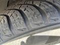 Close-up view of a tire tread from a 2016 Audi A3 showing detailed patterns and grooves designed for traction and performance