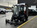 A 2020 Jacobsen HR800 lawn mower with a front-mounted cutting deck and a compact design, featuring large tires and a protective canopy