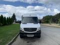 A white 2017 Mercedes-Benz Sprinter van facing forward with a black grille and no visible license plate