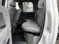 A 2008 Dodge Ram 5500 with gray cloth seats in the back row and a clean interior design