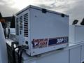 A white American Eagle 30P Piston Series compressor mounted on the back of a 2017 Ford F-550 truck