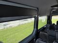 2019 Mercedes-Benz Sprinter interior view showcasing seating arrangement and large side windows