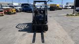 A 2018 Toyota 8FGCU25 forklift facing forward with its forks extended ready for lifting