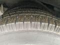 Close-up of a tire on a 2017 Chevrolet Express showing tread patterns and texture