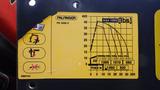 A yellow and black load chart for a Palfinger PK 4200 C showing weight limits at various distances and heights