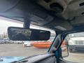 Interior view of a 2020 Jeep Wrangler highlighting the rearview mirror and vehicle's ceiling features