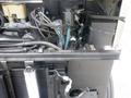 View of the engine compartment of a 2007 Morgan Olson Workhorse W42 showcasing various mechanical components and wiring