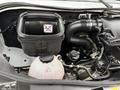 A 2019 Mercedes-Benz Sprinter engine compartment showing the air filter housing and various engine components