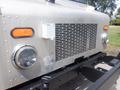 Front view of a silver 2007 Morgan Olson Workhorse W42 featuring round headlights and a detailed metal grille