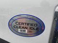 A sticker on a vehicle displaying the words CERTIFIED CLEAN IDLE with a barcode and the Ford logo