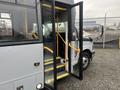 A 2017 Chevrolet Express with an open door revealing the interior and steps leading inside