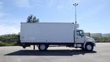 A white 2009 Hino 268 box truck with a tall cargo area and front cab visible from the side