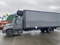 A gray 2018 Hino 308 box truck with a large cargo area and a high roof mounted on top