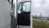 2008 International 7500 truck with an open door revealing the interior and driver seat