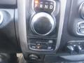 The control panel of a 2019 RAM 1500 Classic Eco Diesel displaying gear shift settings and four-wheel drive options