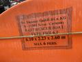 Label on an orange Fassmer 20 Foot Fast Rescue boat displaying specifications including type designation dimensions and maximum capacity