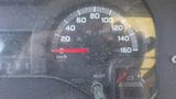 Speedometer of a 2011 Ford Econoline showing speed in kilometers per hour and additional gauges for fuel and temperature