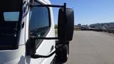 2015 Mitsubishi Fuso FE with a side mirror prominently displayed and a close-up view of the front cab area