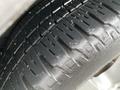 A close-up view of a tire tread showing the patterns and grooves of a 2013 Toyota Sienna tire