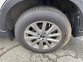 Close-up of a silver alloy wheel with a Yokohama tire from a 2016 Mazda CX-5