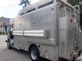 A 2007 Morgan Olson Workhorse W42, featuring a metallic exterior with a large cargo area and multiple features for operational use