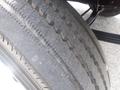 Close-up view of a tire from a 2007 Morgan Olson Workhorse W42 showing tread patterns and wear on the rubber surface