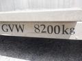 A close-up view of a vehicle's nameplate displaying the text "GVW 8200kg" indicating Gross Vehicle Weight for a 2007 Morgan Olson Workhorse W42