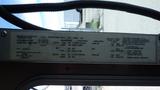 A 2011 Ford Econoline vehicle dashboard with visible manufacturer's label and specifications details