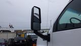 A 2008 Chevrolet C7500 truck with a prominent side mirror displayed in the foreground