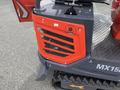 Close-up view of the front panel of a 2024 AGT Mini Excavator featuring distinct orange slats and a circular logo with a symbol and text