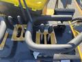 Controls and levers of a 2024 AGT KTT23 Mini Skid Steer showing various handles for operation