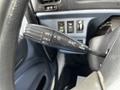 Close-up of the control stalk in a 2006 Hino 268 with settings for headlights and turn signals