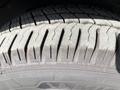 Close-up of a tire with worn tread patterns on a 2017 Chevrolet Express