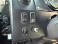 Interior control panel of a 2017 Freightliner M Line featuring switches for lights and a panel light knob