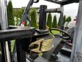 A 2017 Toyota 8FCGCU25 forklift showing the lifting mechanism with a large metal hook and a coil spring attachment